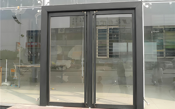 奎屯玻璃地弹门